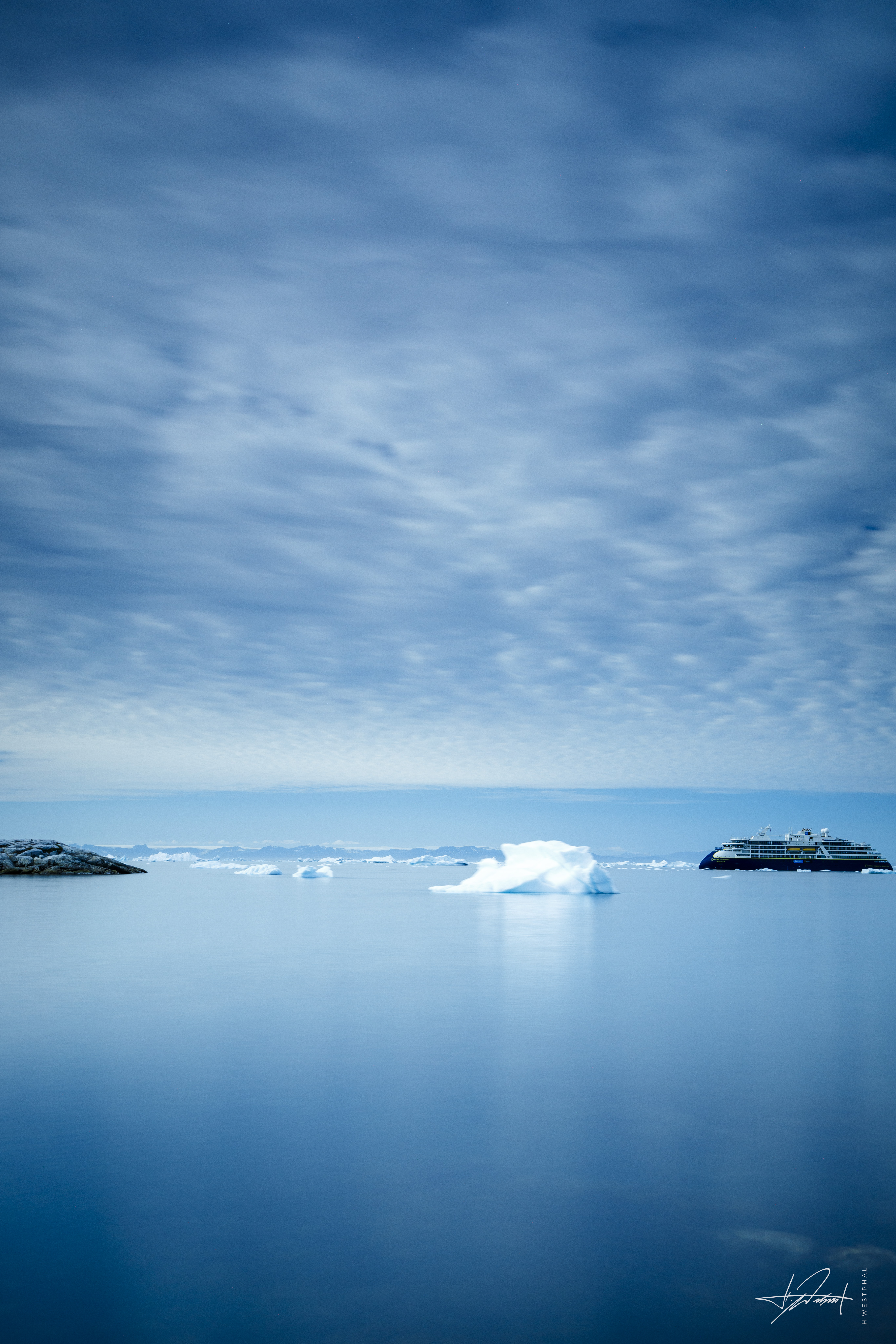 Ship among icebergs